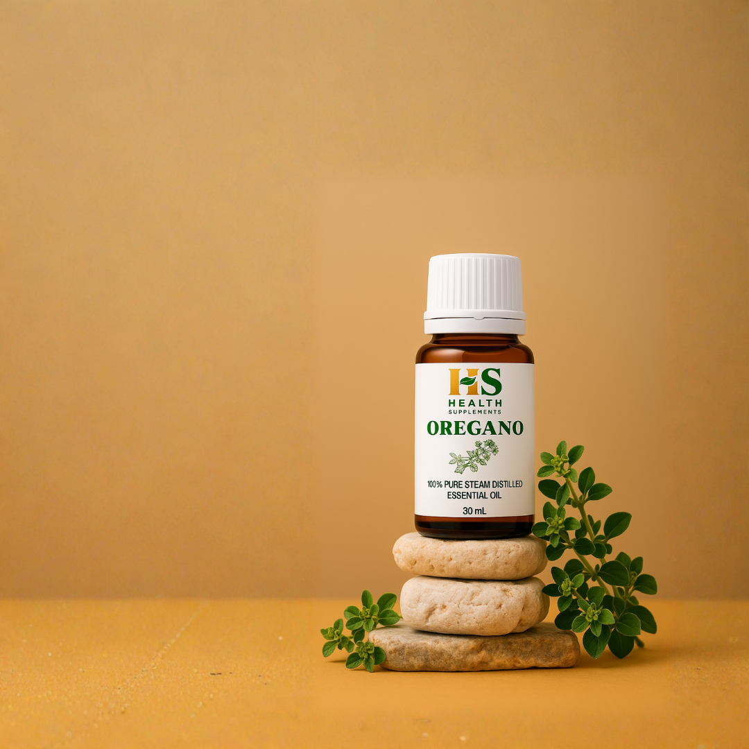 Bottle of oregano essential oil on a yellow background